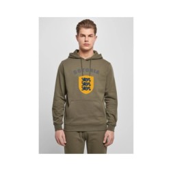 Khaki roheline kapuutsiga pusa ees suur Eesti vapp-vimpel ja kiri ESTONIA