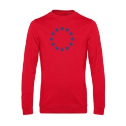 Punane pusa pikkade varrukatega ees suurelt sinisega EU tähering