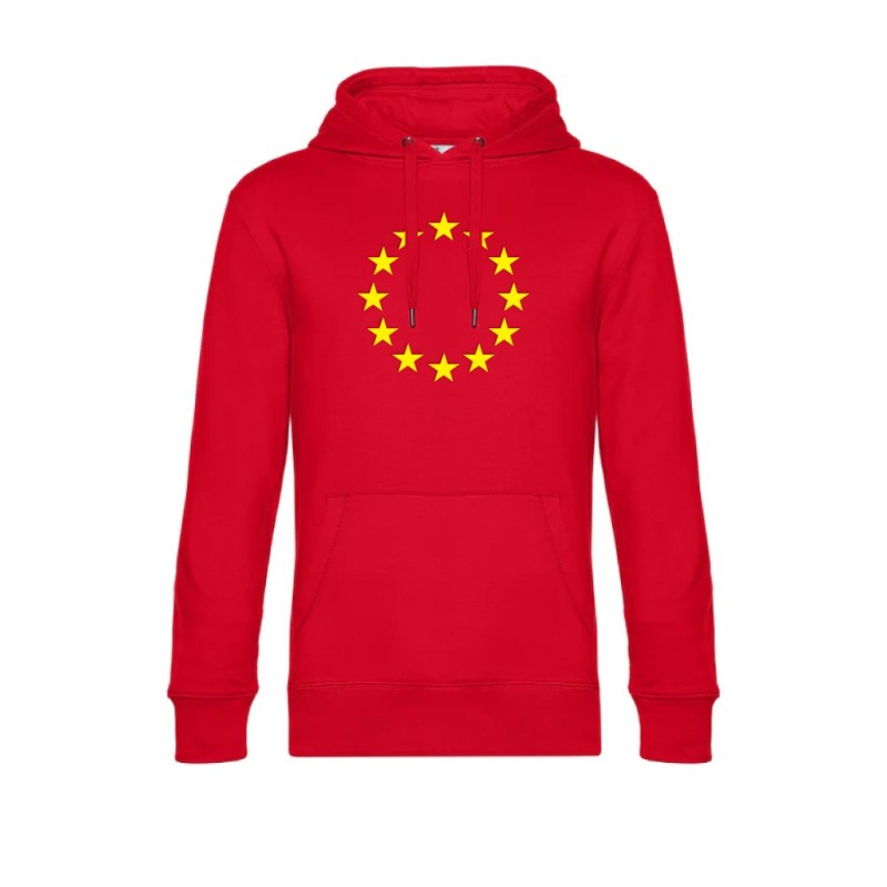 Punane kapuutsiga pusa ees suurelt kollasega EU tähering